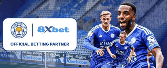8XBET logo và hình ảnh đội bóng Leicester City thi đấu, thể hiện uy tín và các chương trình khuyến mãi hấp dẫn, nổi bật trong lĩnh vực cá cược thể thao trực tuyến tại Việt Nam.